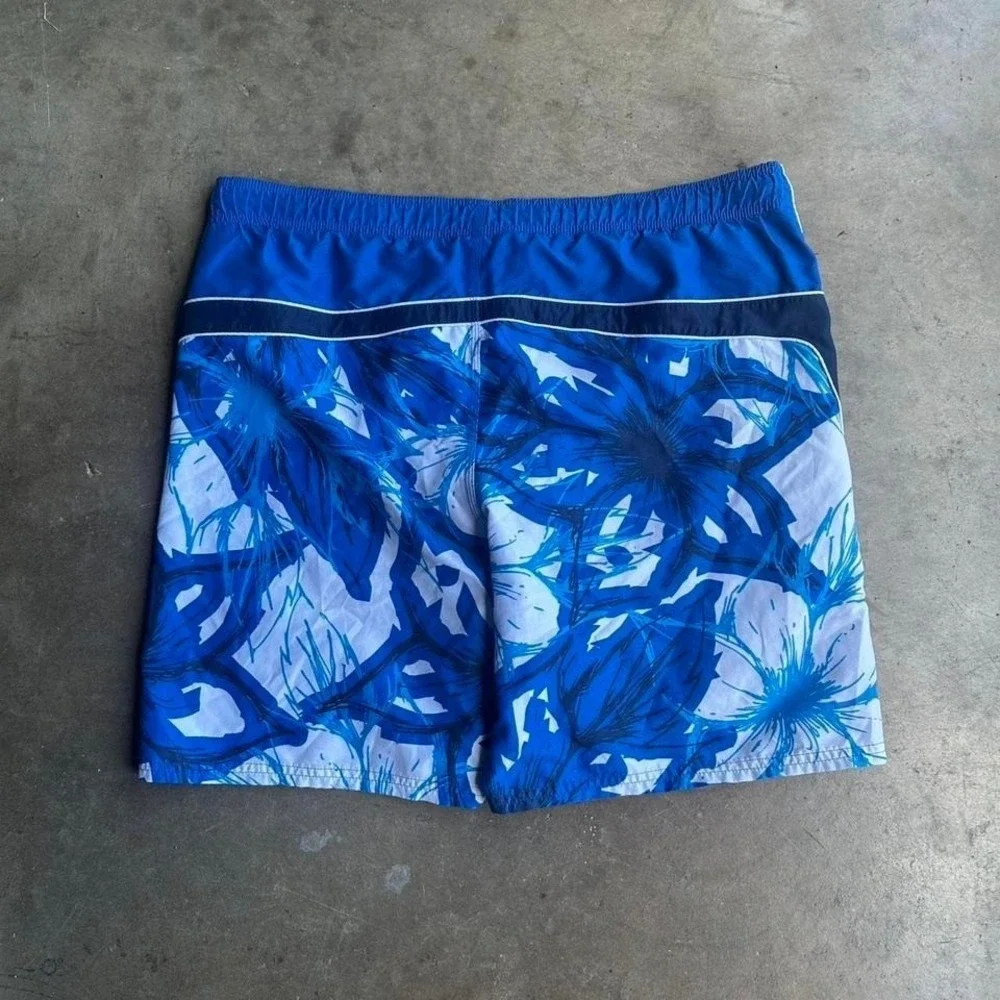 Vintage 2000s Nike blue floral swim trunks size L
